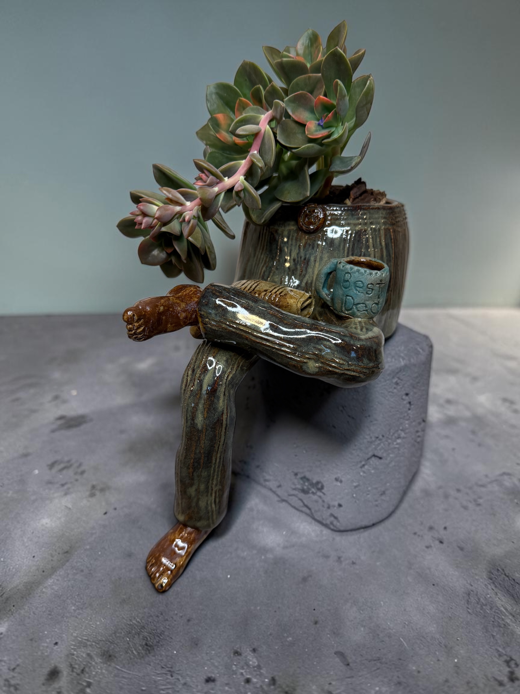 Quiet Morning, a reclining figure with coffee and a newspaper